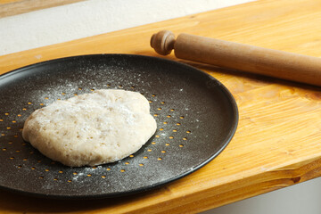 Preparation of classic home made margherita pizza