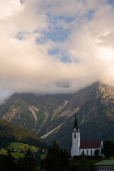 Fototapeta na wymiar A church in Hirschegg, Kleinwalsertal in Austrian alps.