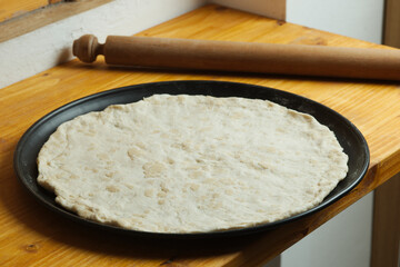 Preparation of classic home made margherita pizza