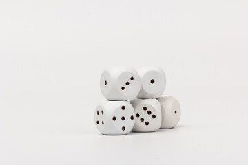 White gamble dice with black dots, isolated on white background.