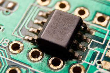 dusty printed circuit Board with components . macro selective focus