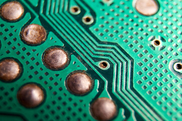 dusty printed circuit Board with components . macro selective focus