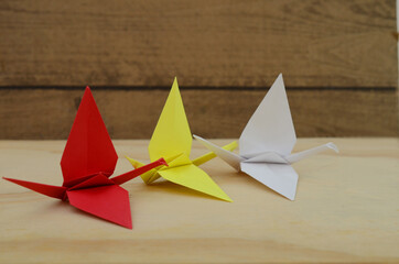 Colorful folded paper cranes