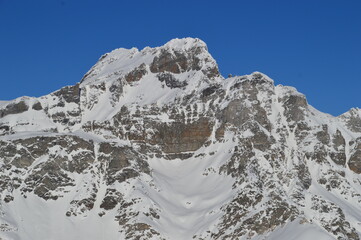 Skiing in the snow covered mountains of the San Domenico Ski Resort in Alps in Northern Italy