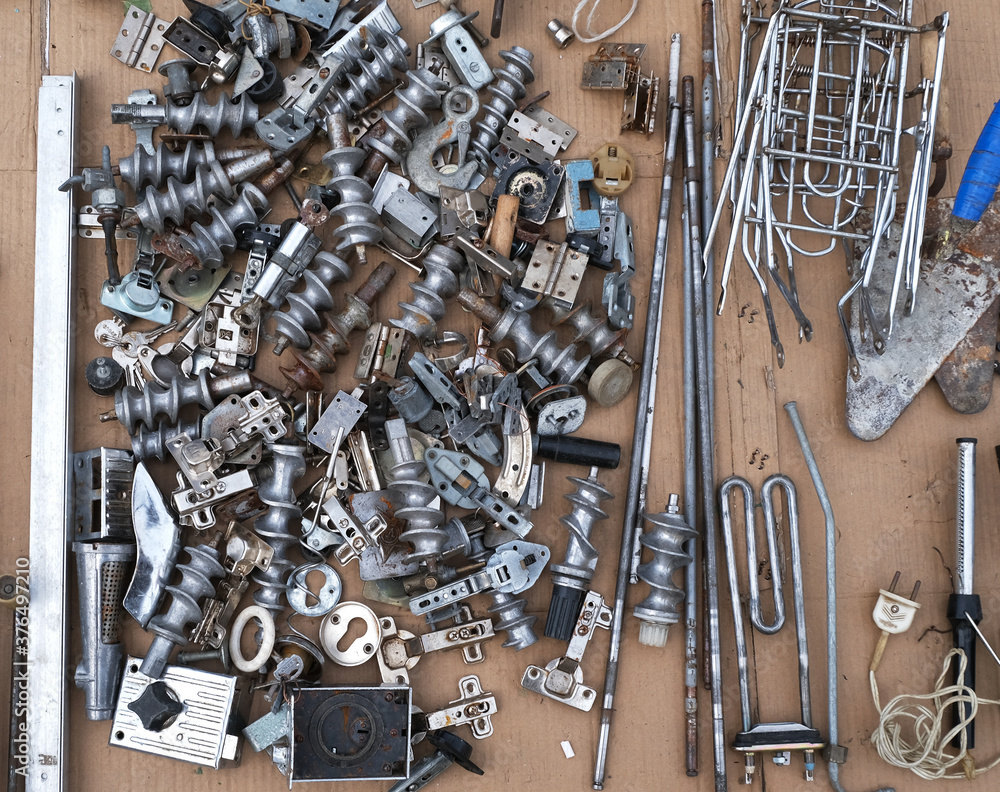 Wall mural old hardware, tools, metal parts at a flea market