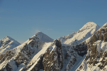 Skiing in the snow covered mountains of the San Domenico Ski Resort in Alps in Northern Italy