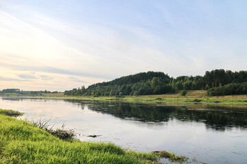 View of the river in the countryside at sunset