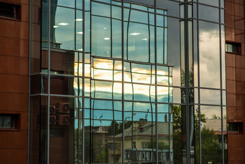 background of glass office building with reflections