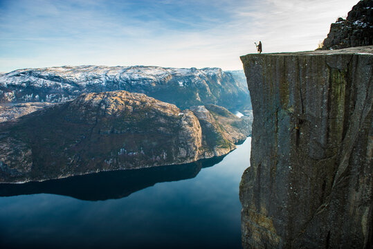 Viking standing at the edge of the amazing pulpit rock in Norway