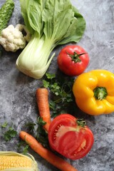 fresh vegetables on wooden table