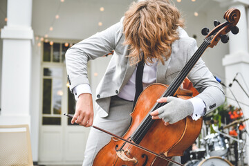 Musician playing  violoncello