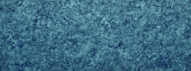 Abstract blue paint splatter background reminiscent of a water splash effect