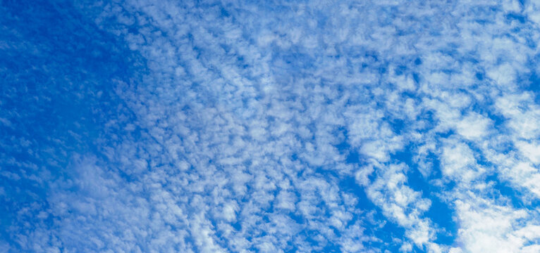 Clouds in the blue sky. Cirrocumulus, cirrostratus cloud, panoramic nature background