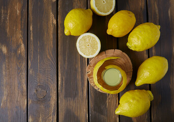 limoncello drink on black wooden surface