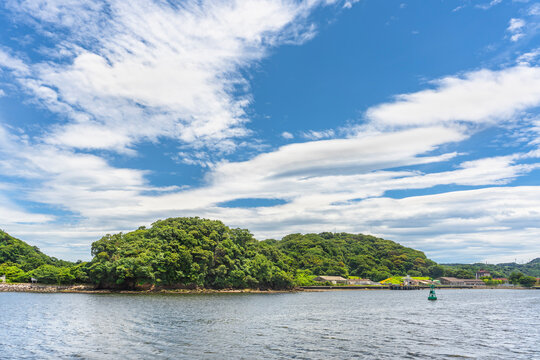 Yokosuka, Japan - July 19 2020: Azuma Island In The Yokosuka Naval Port Belonging To The US Navy Azuma Storage Area And Separating The Japan Self Denfence Fleet From The United States Seventh Fleet.