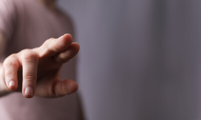 Naklejka premium A man hand touching virtual screen, modern background concept , can put your text at the finger, copy space.