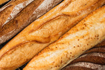 close up view of fresh baked baguette loaves