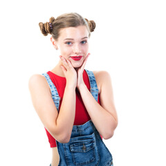 Pretty teen girl, portrait over white background. Beautiful woman wearing red top and blue jeans. Young charming lady with blue eyes and blond hair