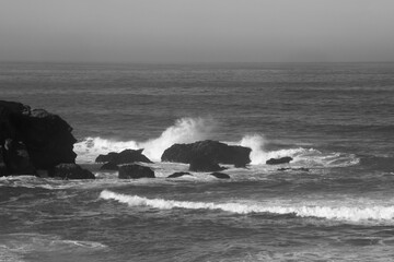 Surf breaking on a rocky shore