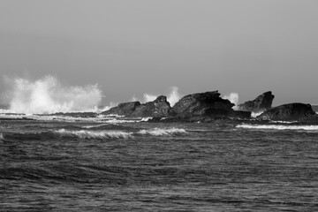Surf breaking on a rocky shore