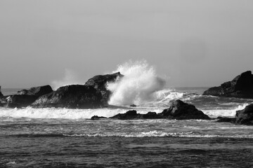 Surf breaking on a rocky shore