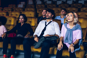 Audience is happy and exciting in movie theater cinema. Group recreation activity and entertainment...