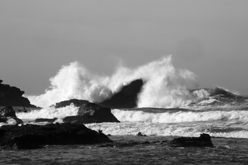 Surf breaking on a rocky shore