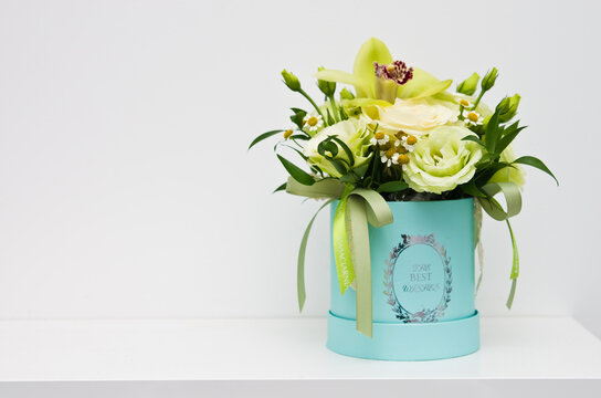 Elegant Bouquet In Blue Flower Box On White Background