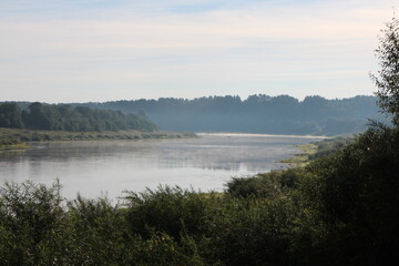 View of the misty river from the morning in summer
