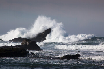 Rocks greeting the waves