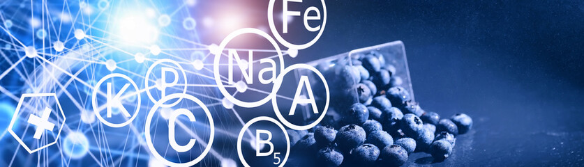 Obraz premium Water drops on ripe sweet blueberry. Fresh blueberries background with copy space for your text. Vegan and vegetarian concept. Macro texture of blueberry berries.