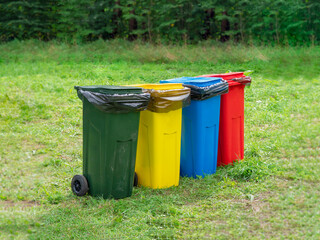 Multi-colored containers for separate garbage collection
