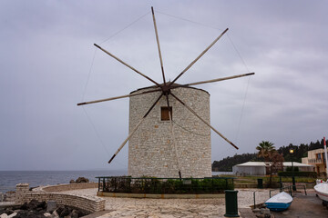 Fototapeta na wymiar Windmill by the sea