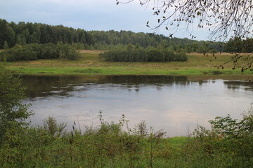 View of the river in the countryside at sunset
