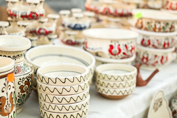 Happy colorful ceramics. Traditional Romanian handmade ceramics market at the potters fair from Sibiu, Romania