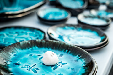 Happy colorful ceramics. Traditional Romanian handmade ceramics market at the potters fair from Sibiu, Romania