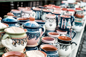 Happy colorful ceramics. Traditional Romanian handmade ceramics market at the potters fair from Sibiu, Romania