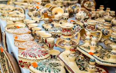 Happy colorful ceramics. Traditional Romanian handmade ceramics market at the potters fair from Sibiu, Romania
