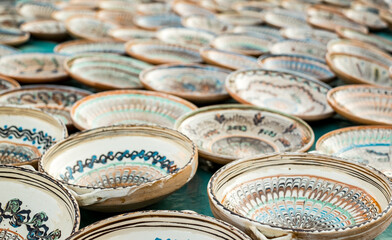 Happy colorful ceramics. Traditional Romanian handmade ceramics market at the potters fair from Sibiu, Romania