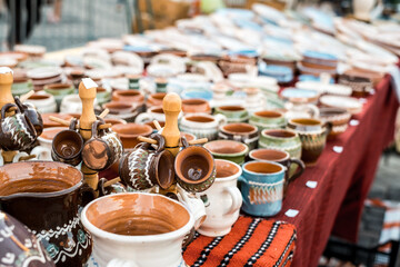 Happy colorful ceramics. Traditional Romanian handmade ceramics market at the potters fair from Sibiu, Romania