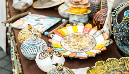 Happy colorful ceramics. Traditional Romanian handmade ceramics market at the potters fair from Sibiu, Romania