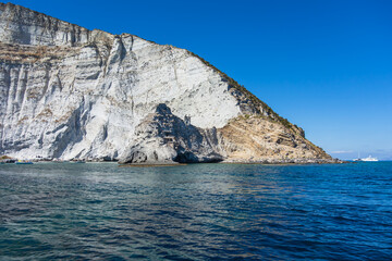 The bay of the seagull's nest along the rocky coast of Palmarola island (Ponza, Latina, Italy).