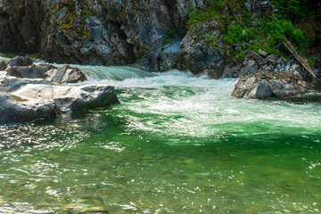 Naklejka na ściany i meble Rock formations in the creek at Kleanza Creek Provincial Park, British Columbia, Canada