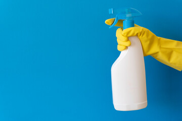 Cleaning agent in a white bottle on blue background