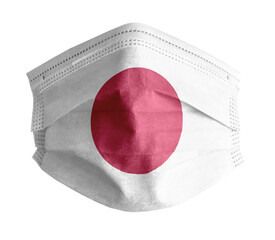 Mascarilla sanitaria para Covid con fondo blanco y la bandera de Japon 