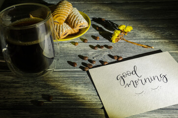 Cake still life with cup of coffee highlighted of sunlight