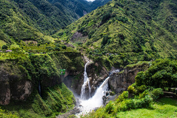Fototapeta na wymiar Waterfall in the middle of mountains