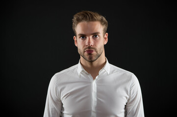 Expert haircare. Handsome guy with stylish haircut dark background. Hair care and styling cosmetics. Mens hair products. Salon haircare. Barbershop. Beard grooming. Shampoo and conditioner