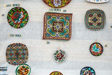 Happy colorful ceramics. Traditional Romanian handmade ceramics market at the potters fair from Sibiu, Romania