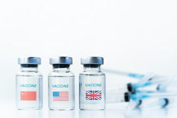 Transparent vials with USA, UK, China flag. Vaccine, syringe for covid-19 coronavirus, flu,infectious diseases. Injection after clinical trials for vaccination of human, people.Medicine, drug concept